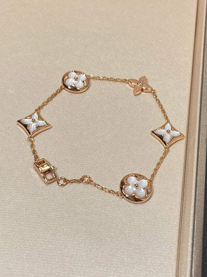 [Triumph Jewelry]STAR AND SUN 5 MOTIF MOP PINK GOLD BRACELET