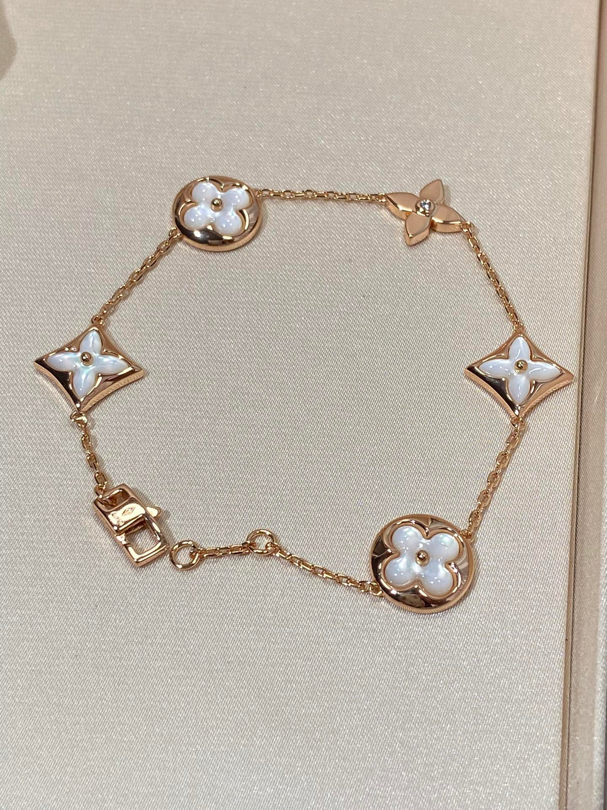 [Triumph Jewelry]STAR AND SUN 5 MOTIF MOP PINK GOLD BRACELET