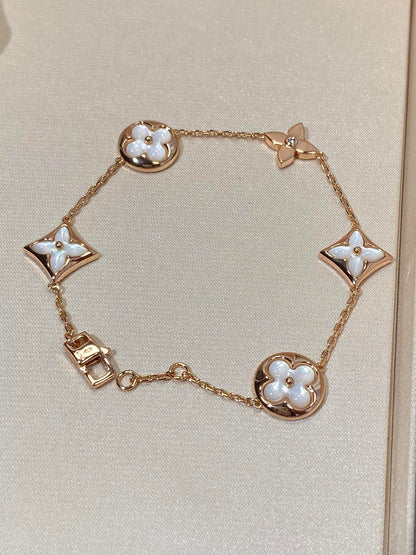 [Triumph Jewelry]STAR AND SUN 5 MOTIF MOP PINK GOLD BRACELET