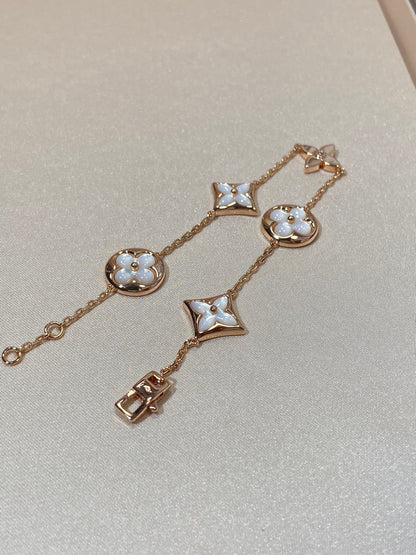[Triumph Jewelry]STAR AND SUN 5 MOTIF MOP PINK GOLD BRACELET