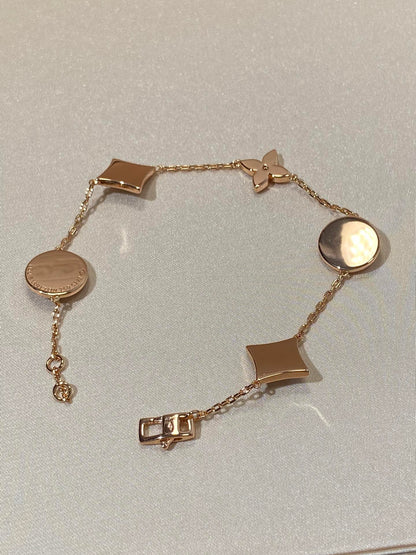 [Triumph Jewelry]STAR AND SUN 5 MOTIF MOP PINK GOLD BRACELET