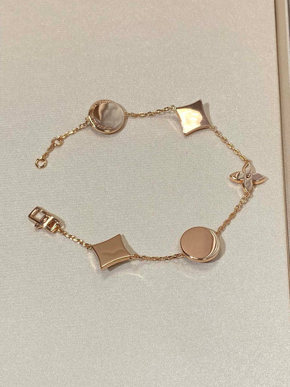 [Triumph Jewelry]STAR AND SUN 5 MOTIF MOP PINK GOLD BRACELET