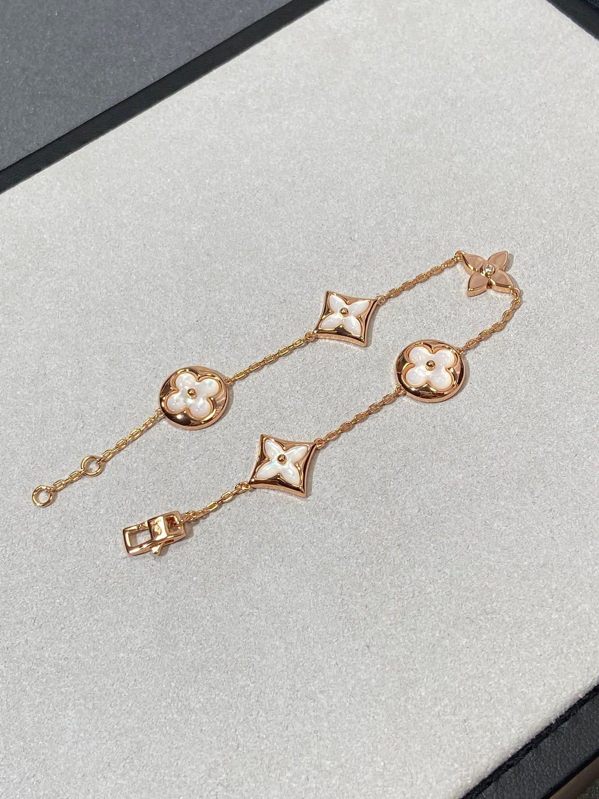 [Triumph Jewelry]STAR AND SUN 5 MOTIF MOP PINK GOLD BRACELET