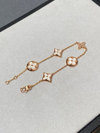 [Triumph Jewelry]STAR AND SUN 5 MOTIF MOP PINK GOLD BRACELET