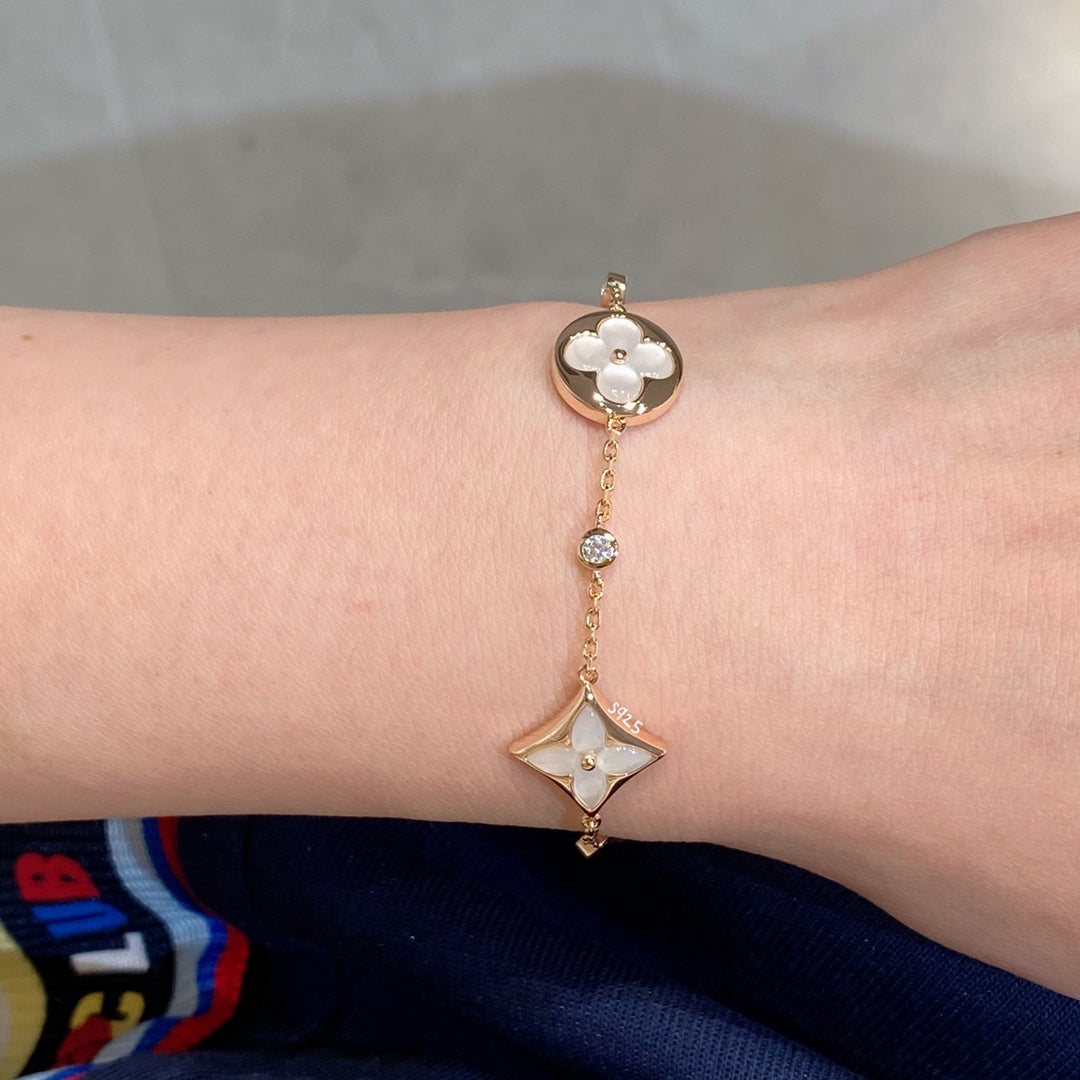 [Triumph Jewelry]STAR AND SUN 4 MOTIF WHITE MOP PINK GOLD BRACELET