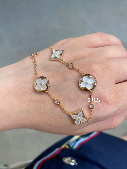 [Triumph Jewelry]STAR AND SUN 4 MOTIF WHITE MOP PINK GOLD BRACELET