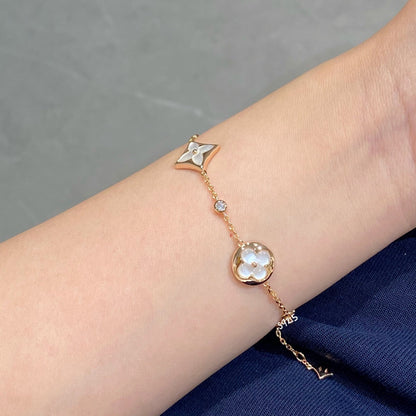 [Triumph Jewelry]STAR AND SUN 4 MOTIF WHITE MOP PINK GOLD BRACELET