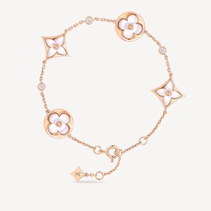 [Triumph Jewelry]STAR AND SUN 4 MOTIF WHITE MOP PINK GOLD BRACELET