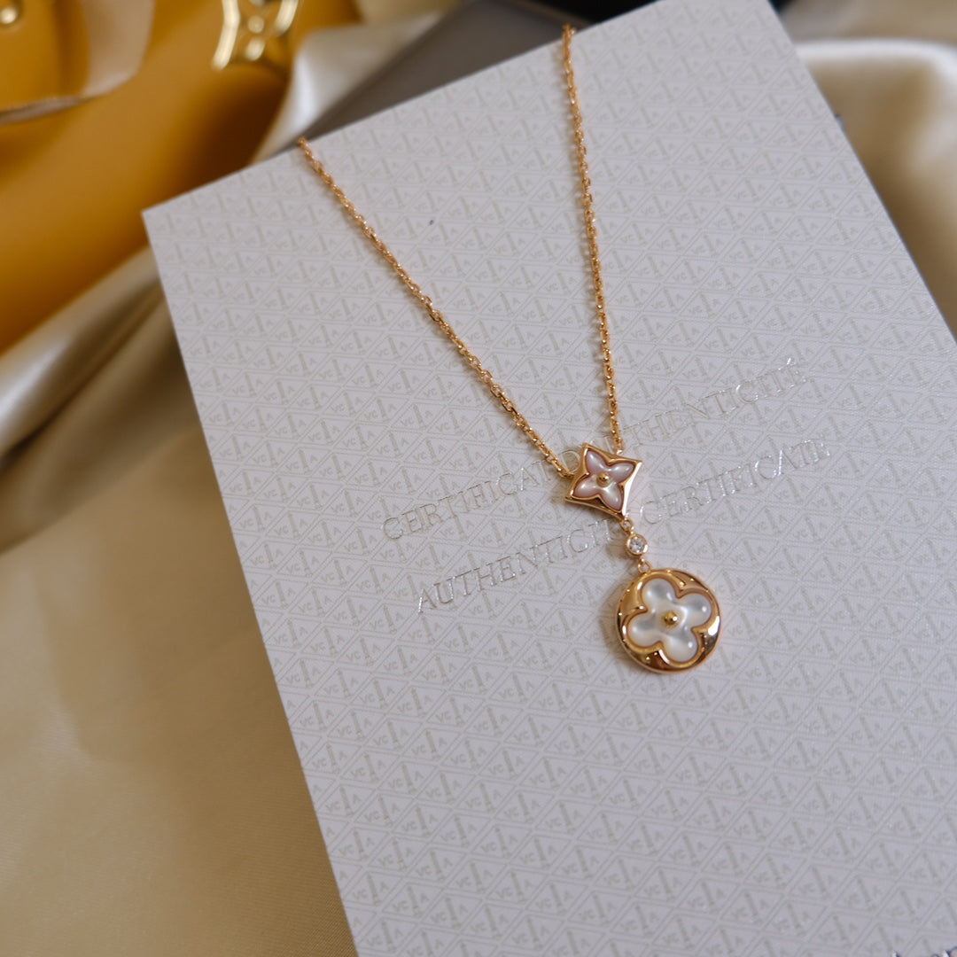 [Triumph Jewelry]STAR AND SUN WHITE MOP 2 MOTIF PINK GOLD NECKLACE