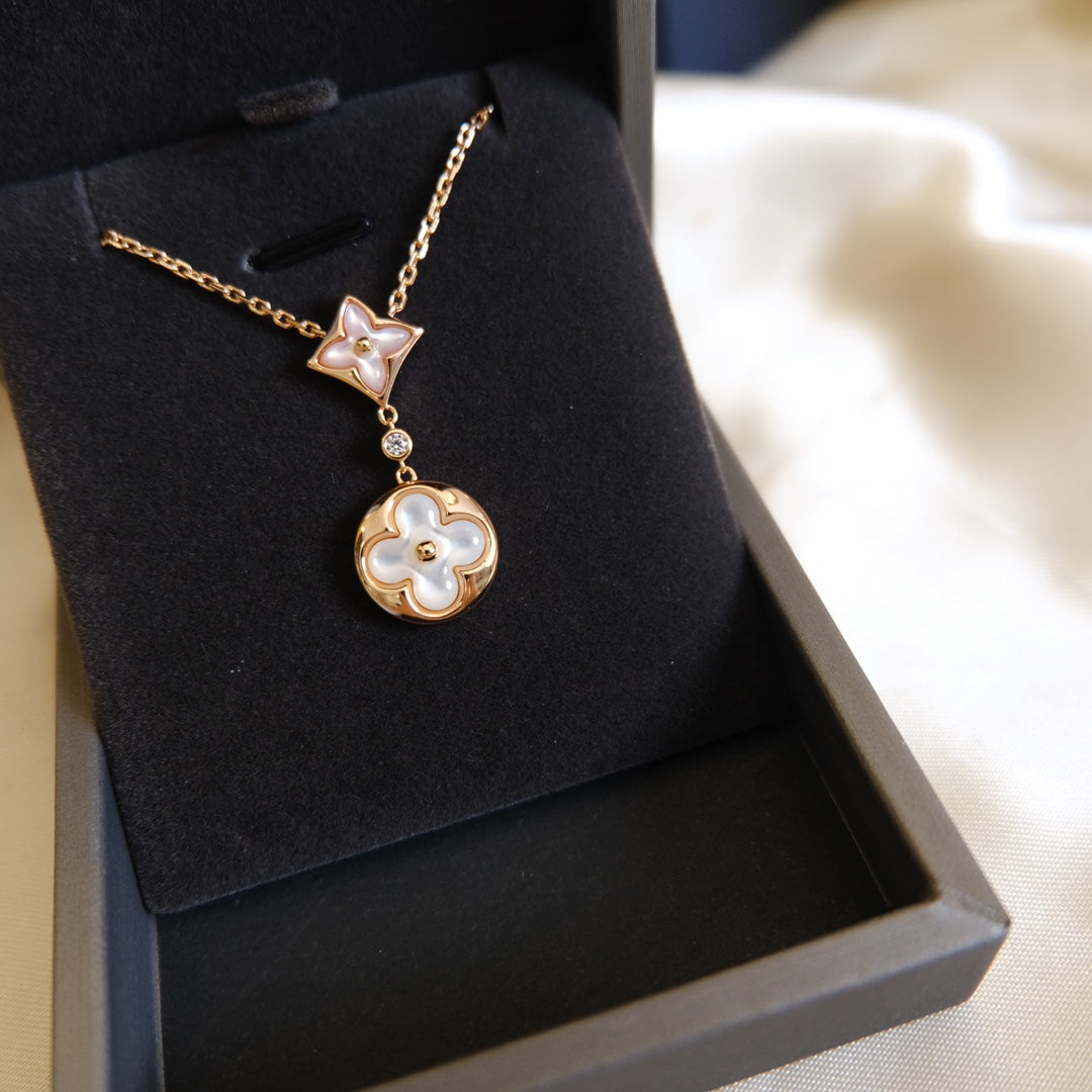 [Triumph Jewelry]STAR AND SUN WHITE MOP 2 MOTIF PINK GOLD NECKLACE