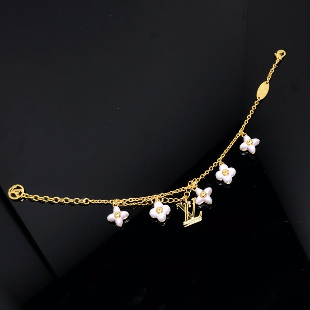 [Triumph Jewelry]LOGO 6 MOTIF STAR AND SUN GOLD BRACELET