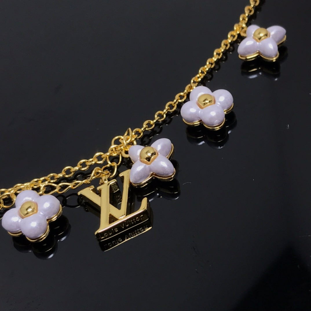 [Triumph Jewelry]LOGO 6 MOTIF STAR AND SUN GOLD BRACELET