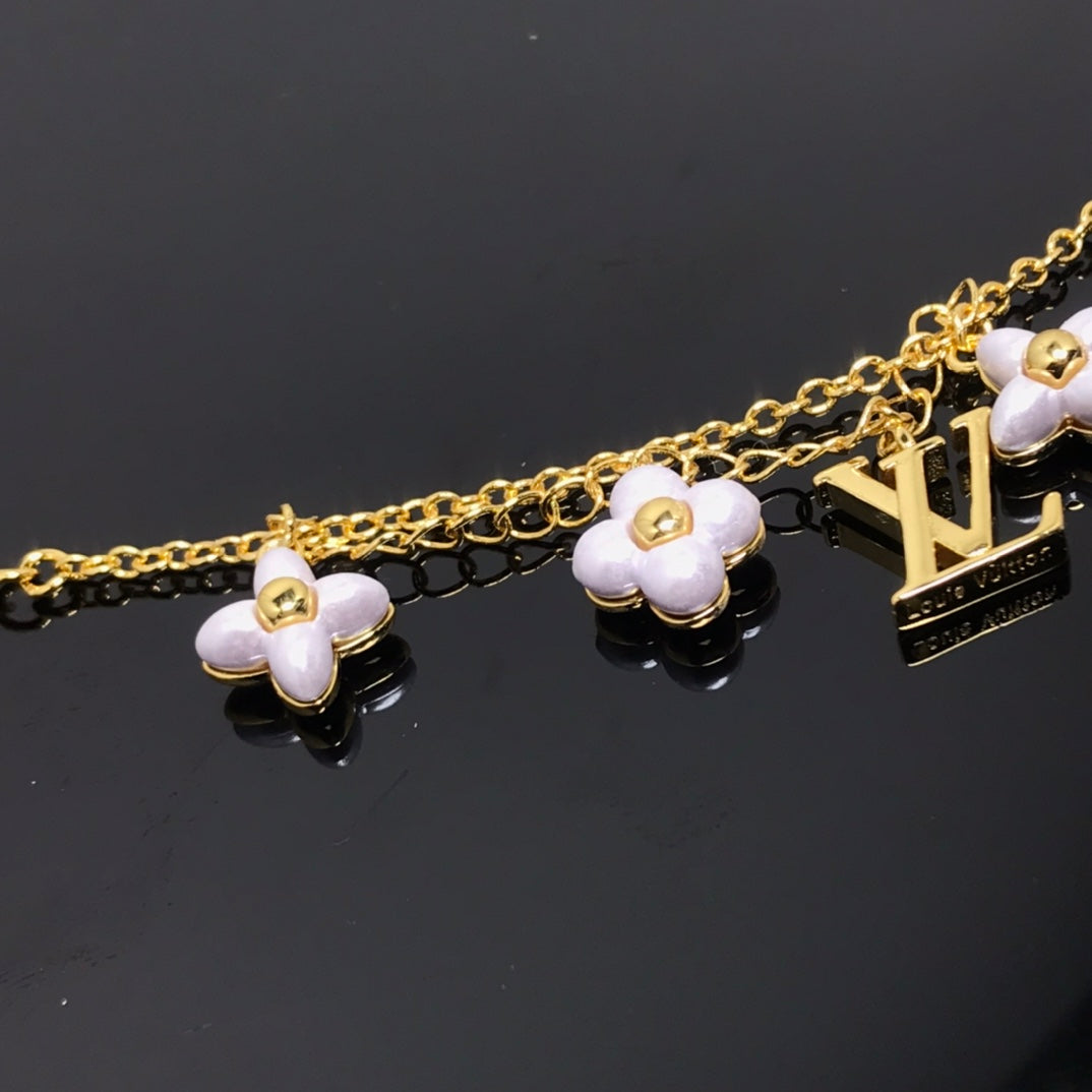 [Triumph Jewelry]LOGO 6 MOTIF STAR AND SUN GOLD BRACELET