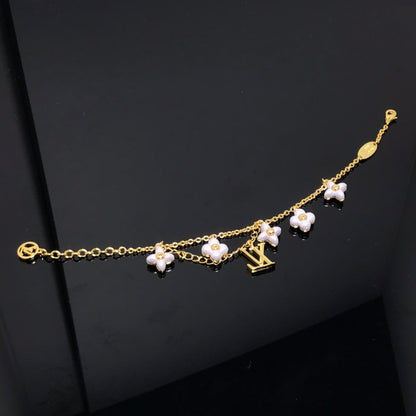 [Triumph Jewelry]LOGO 6 MOTIF STAR AND SUN GOLD BRACELET