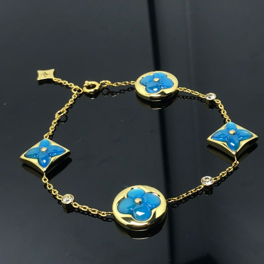 [Triumph Jewelry]STAR AND SUN 4 MOTIF BLUE BRACELET